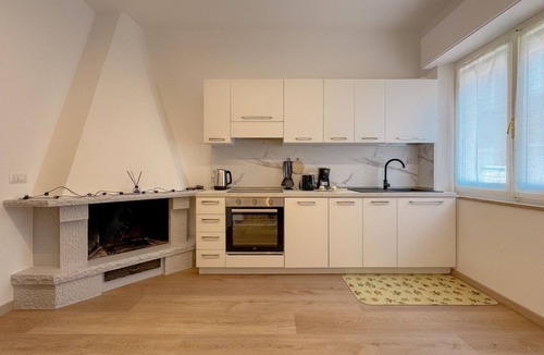 Civitanova Marche Apartment | Welcome to this spacious and flexible solution right in Via Friuli, just a 3-minute walk from the North Seafront of Civitanova Marche. Two fully equipped one-bedroom apartments combined into one large unit – ideal for two couples, large families or wor