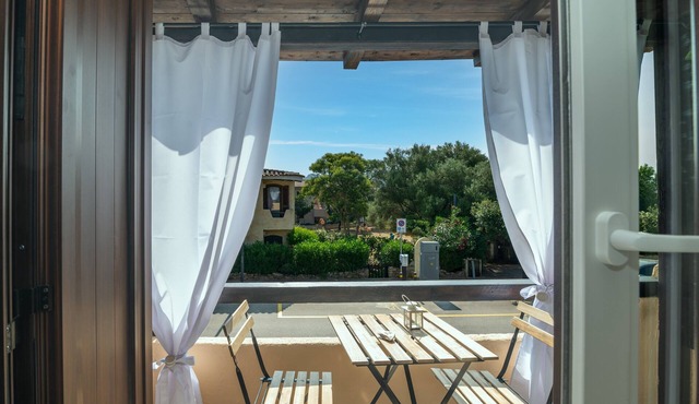 Apartment 'Angolo Di Mare - Cannigione' with Private Terrace, Wi-Fi and Air Conditioning