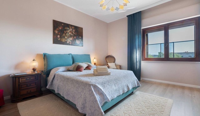 Casa Vacanze 'Lele' in the Heart of Sarroch, Near Famous Beaches