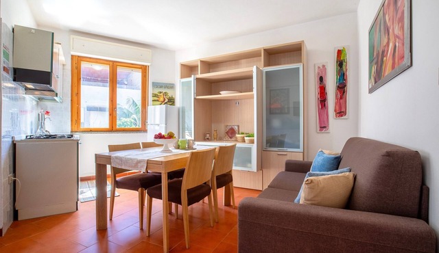 Charming Seaside Apartment with Balcony