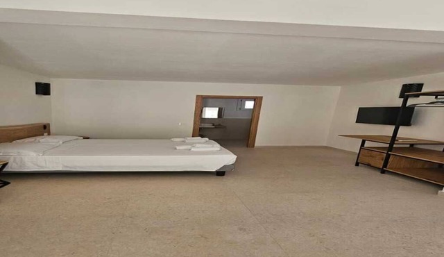 Comfortable studio apartment 100 meters from the beach, surrounded by greenery