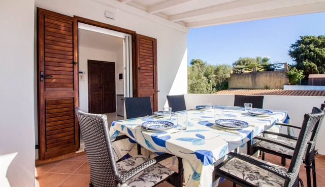 GuestHost - Charming 60 sqm apartment located *1.2 km from Porto Istana Beach*. The accommodation is on the *first floor* (stairs required for access) and can accommodate up to *5 adults*.The property consists of *two bedrooms, a bathroom, a livin