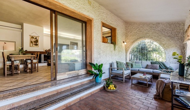 Holiday Home 'Charme' at La Maddalena Spiaggia with Garden and BBQ