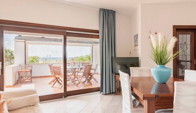 Holiday Home 'Villetta Fronte Mare A S. Reparata' with Sea View, Wi-Fi and Air Conditioning