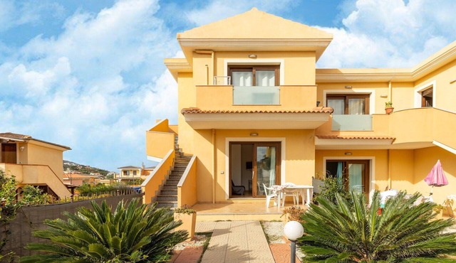 In a residence with a private patio and air conditioning