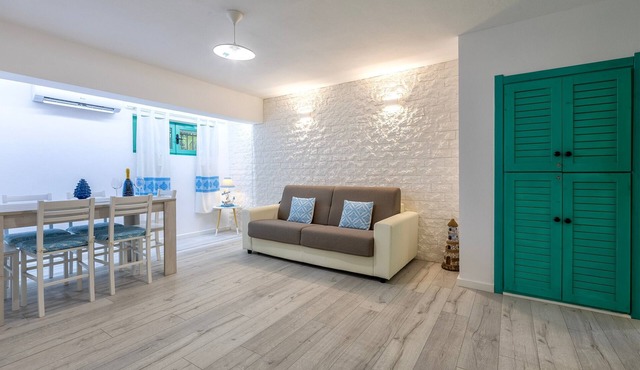 'La Sorrera De Mar Casa Vacanze' Apartment with Shared Garden and Air Conditioning