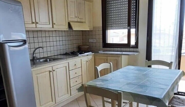 Large two-room apartment on the first floor, with balcony and bathroom.