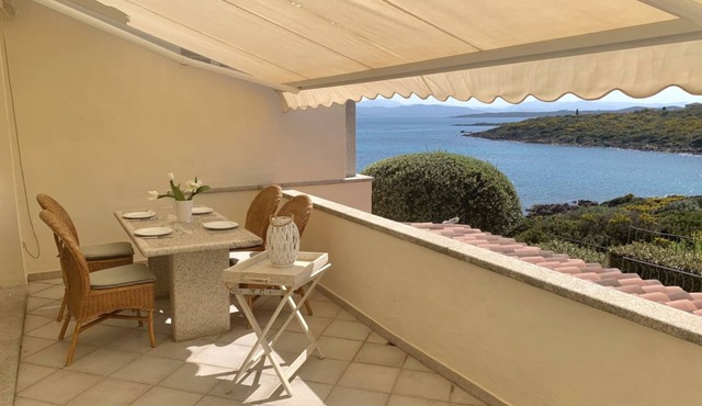 Located in the side area of the residence, Elicriso is a one-bedroom apartment of approximately 55 sqm on the first floor, featuring a stunning sea view and a spacious panoramic terrace of 14 sqm. The terrace is furnished with a grani