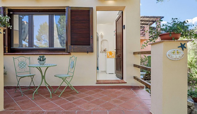 Porto Rotondo Garden Apartment with Mountain View, Wi-Fi, and Air Conditioning