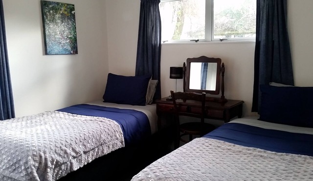 Self-Contained Twin Suite with Private Entry – Quiet Stay in Auckland