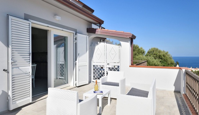 Vacation Home Cala Gonone near the Beach with Sea & Mountain View, A/C, Wi-Fi & Terrace
