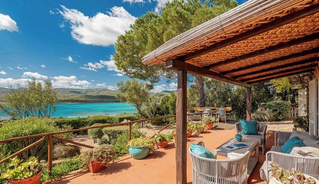 Villa by Porto Istana's crystal-clear waters