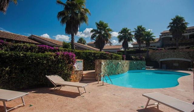 Villa Elegance Sabrina near the beach with pool, air conditioning, garden, and terrace