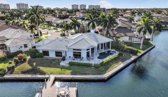 Waterfront property with stunning views within walking distance to the beach. in Marco Island