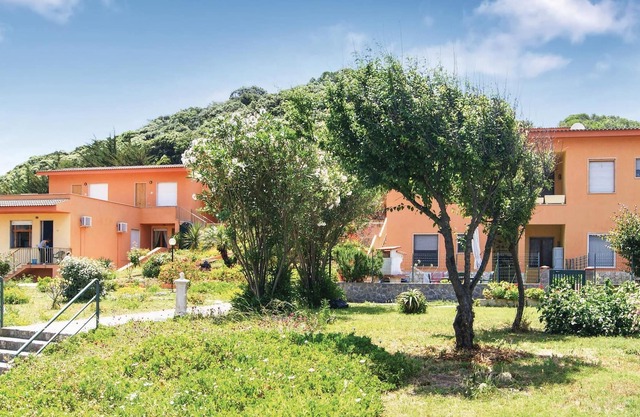 This apartment is located in a residential complex in front of the tourist port of Castelsardo, in S