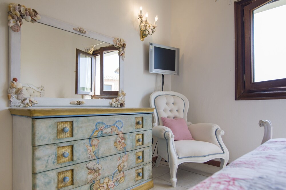 Photo of Bedroom in Capo Ferro