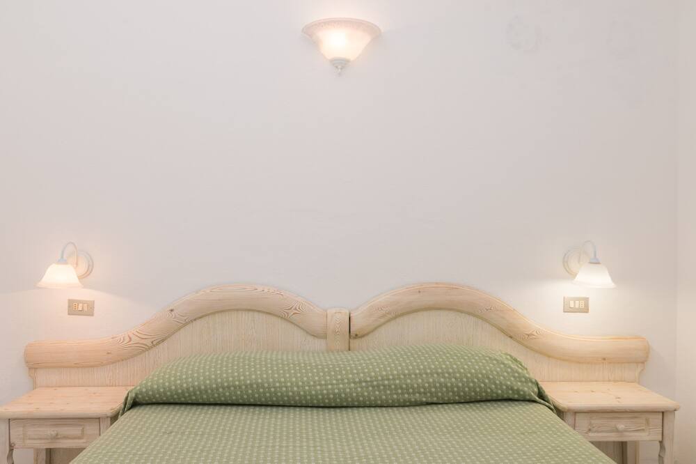 Photo of Bedroom in Capo d'Orso