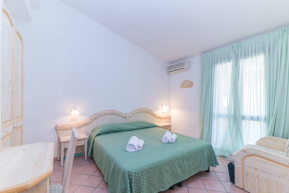 Photo of Bedroom in Capo d'Orso