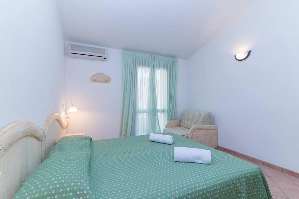 Photo of Bedroom in Capo d'Orso