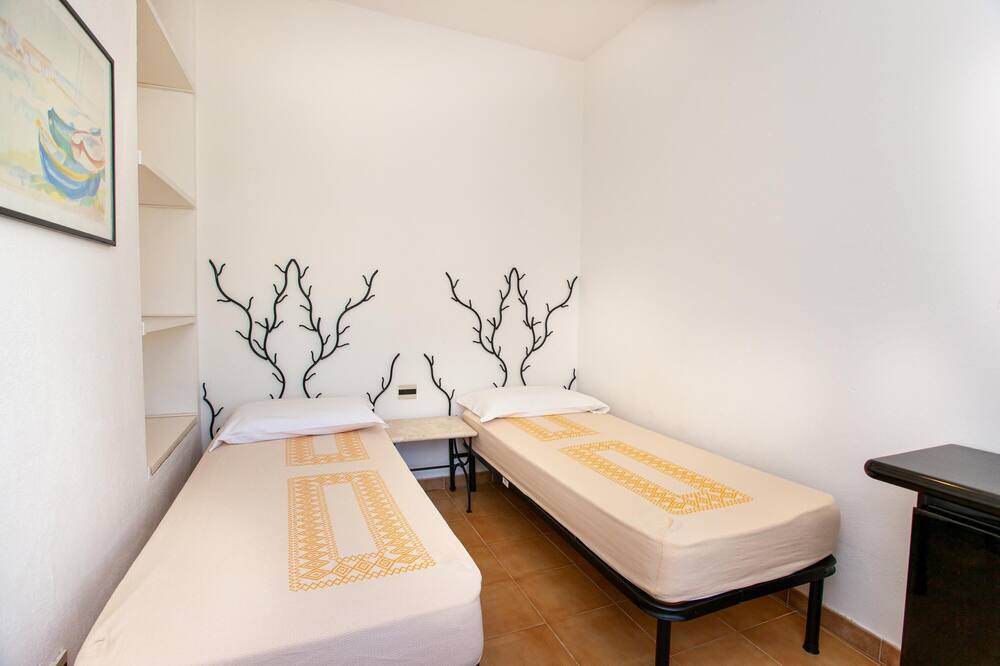 Photo of Bedroom in Cala Liberotto