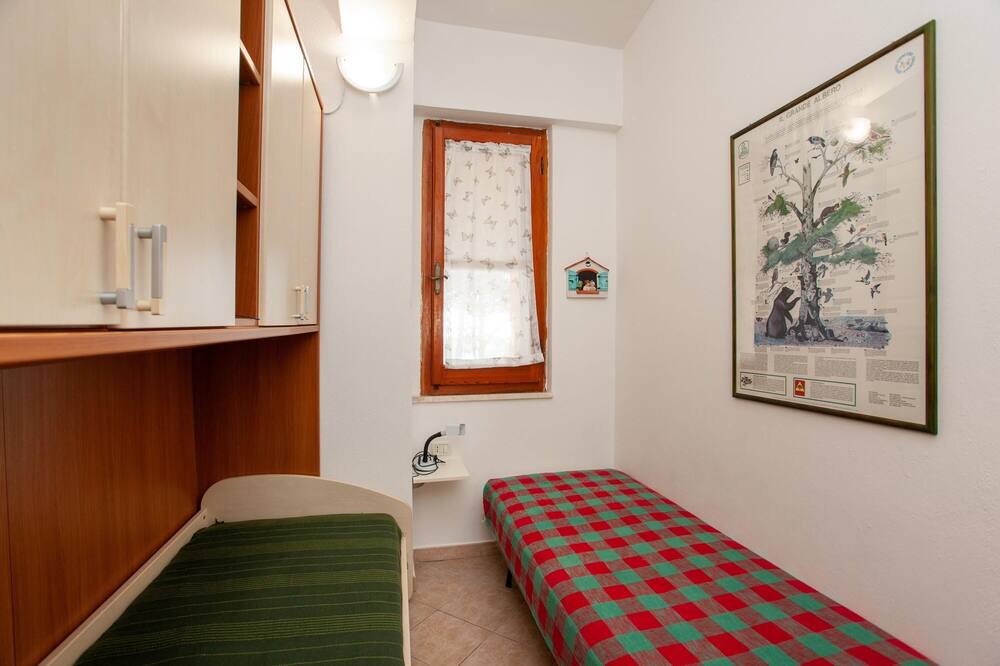 Photo of Bedroom in Cala Liberotto
