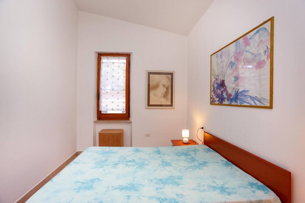 Photo of Bedroom in Cala Liberotto