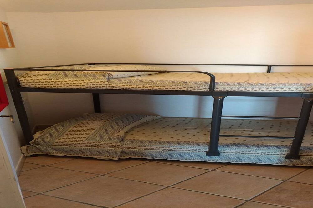 Photo of Bedroom in Cala Liberotto