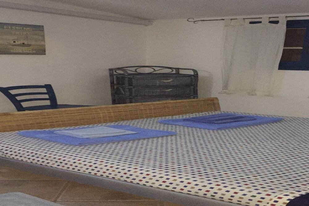 Photo of Bedroom in Cala Liberotto
