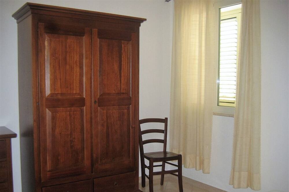 Photo of Bedroom in Cala Liberotto