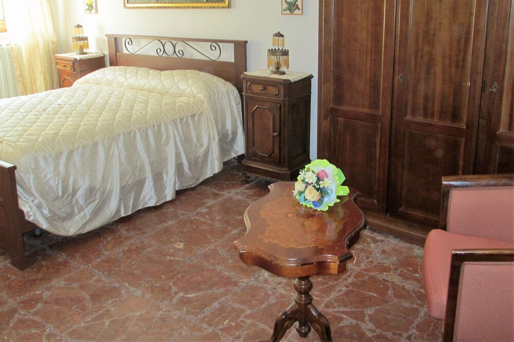 Photo of Bedroom in Piazza-Tralia-Pendolo