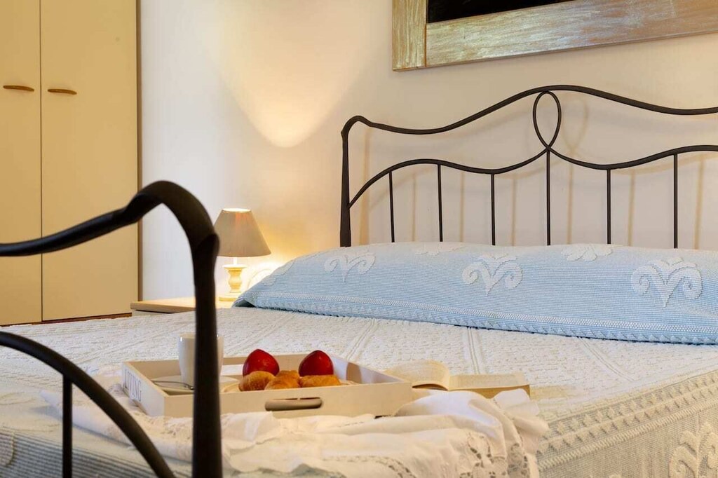 Photo of Bedroom in Capo Coda Cavallo