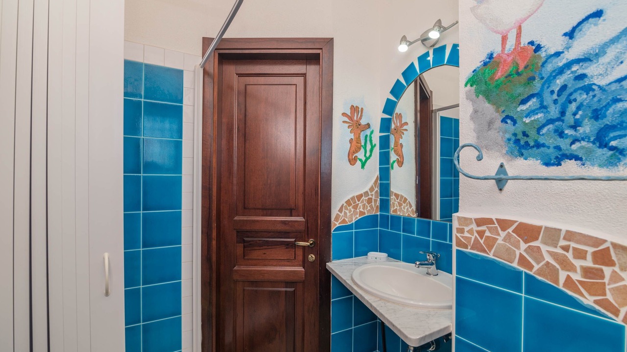Photo of Bathroom in Case Peschiera-Lu Fraili