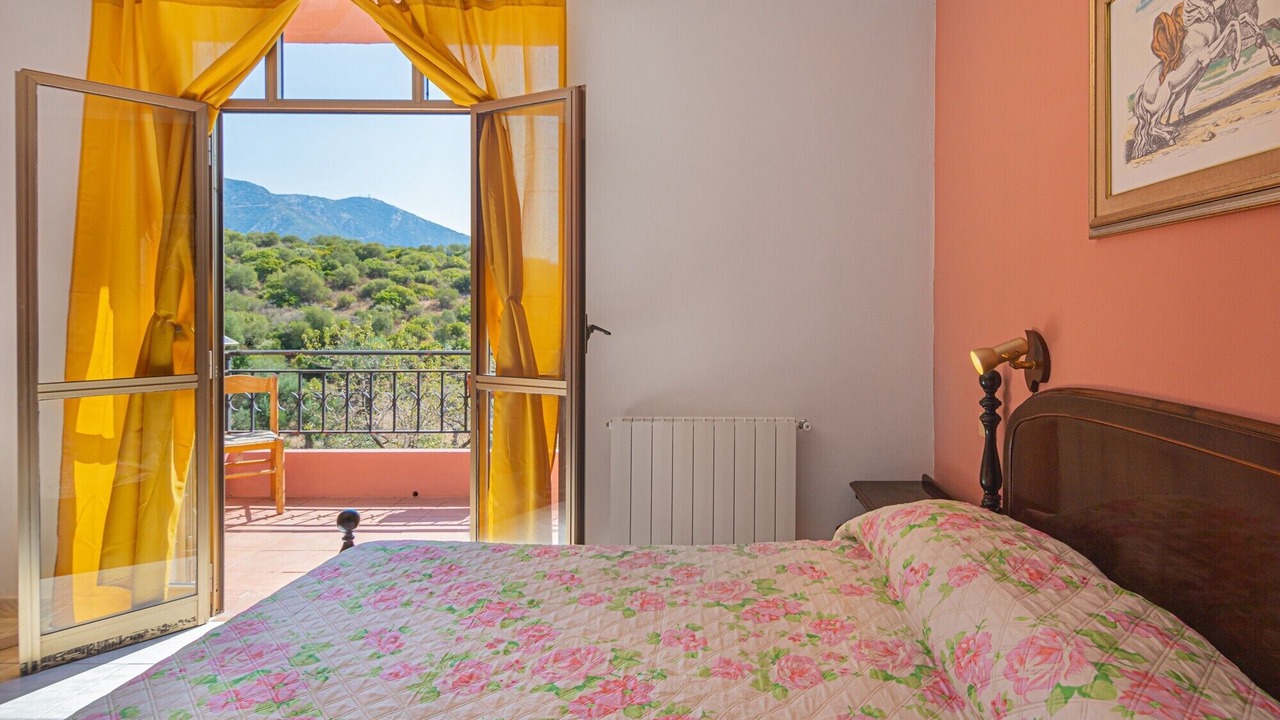 Photo of Bedroom in Iglesias Historic Centre