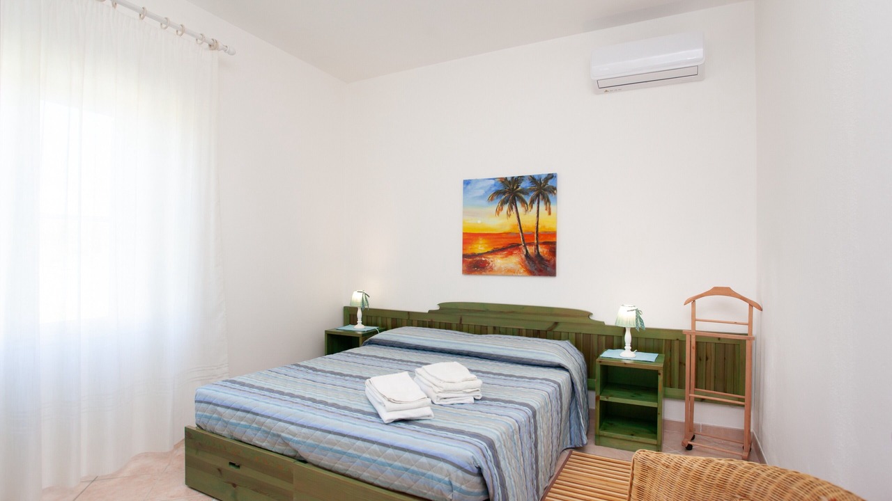 Photo of Bedroom in Cala Liberotto