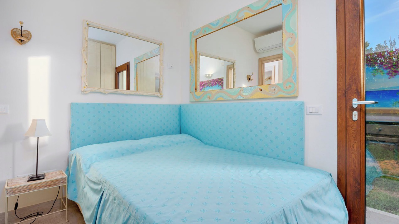 Photo of Bedroom in Baia Caddinas