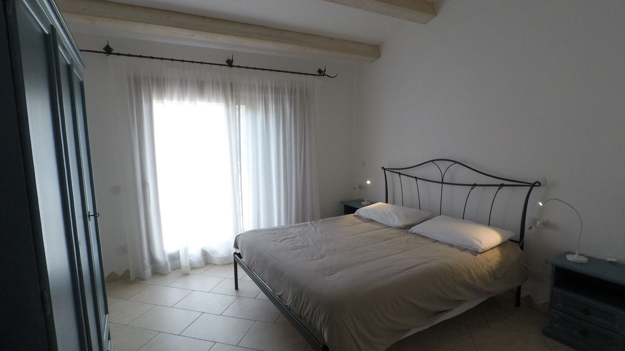 Photo of Bedroom in Cala Liberotto