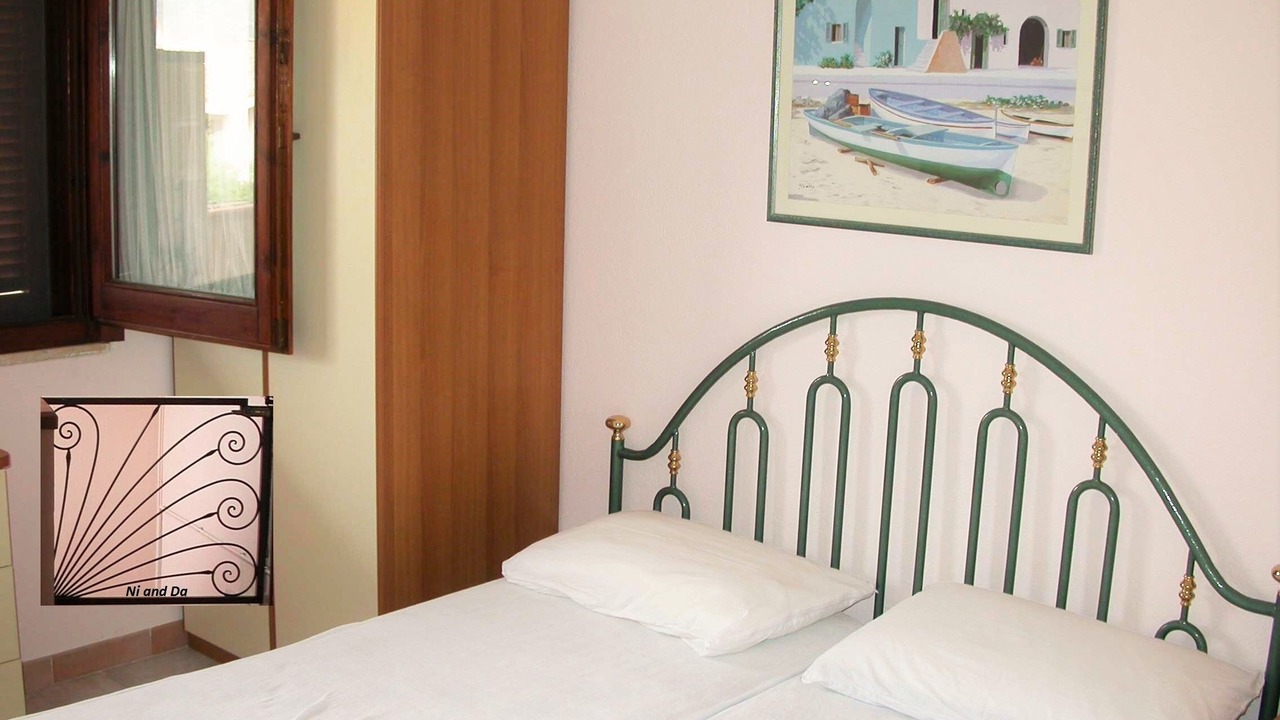 Photo of Bedroom in Villasimius