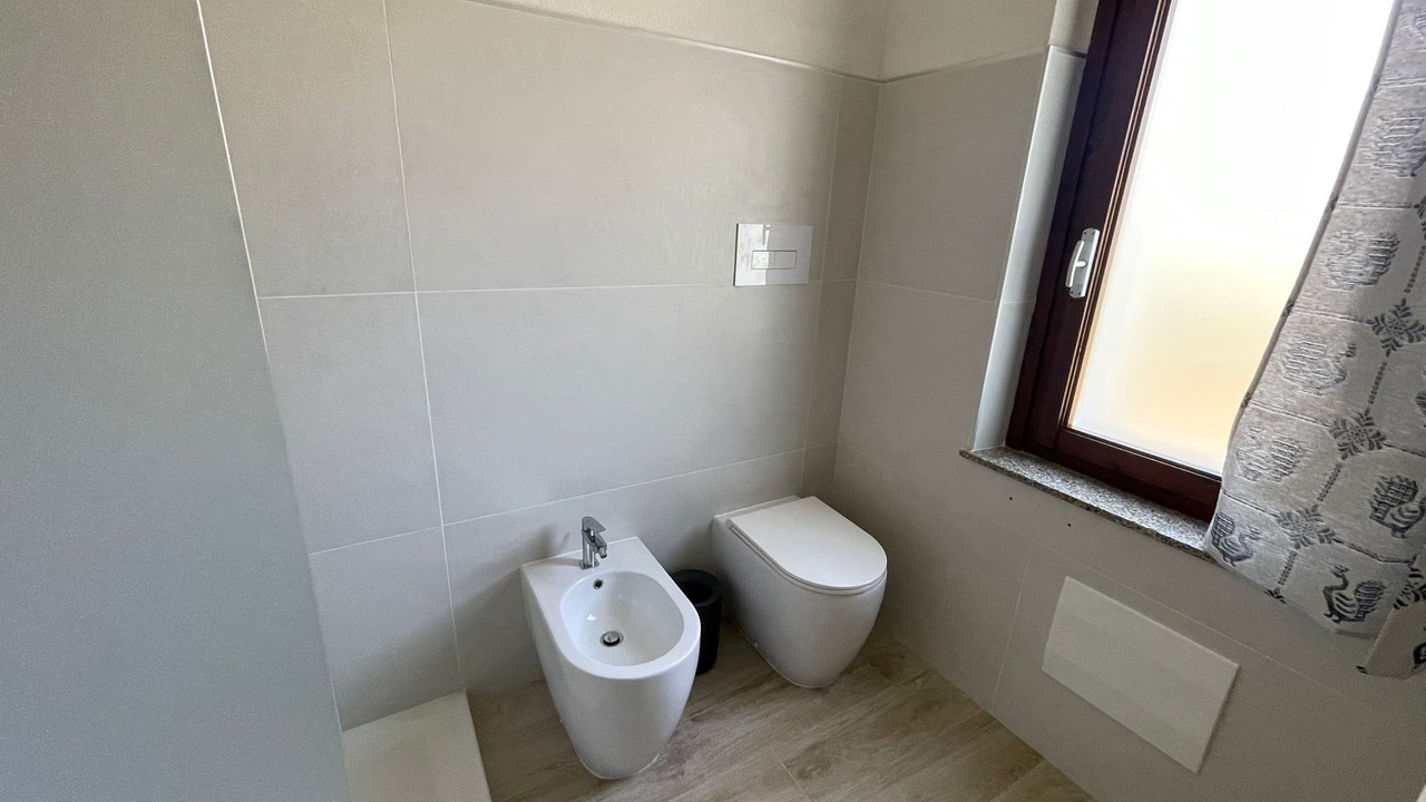 Photo of Bathroom in Case Peschiera-Lu Fraili