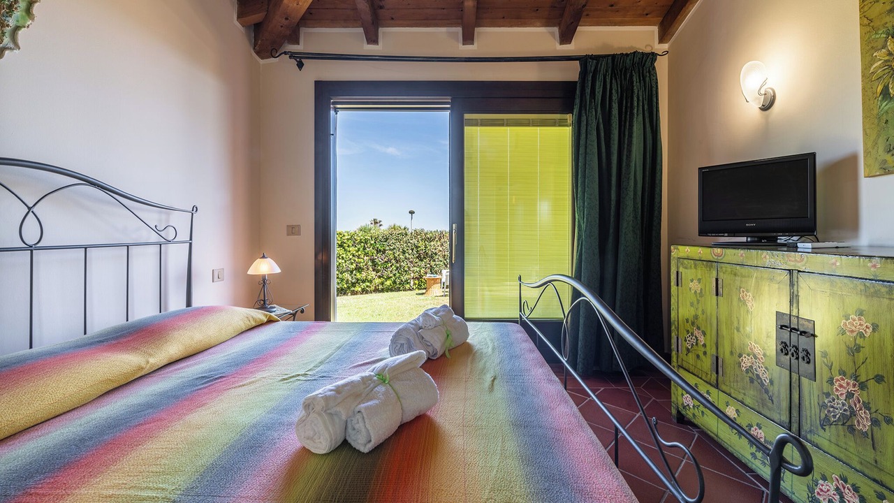 Photo of Bedroom in Punta De Su Turrione