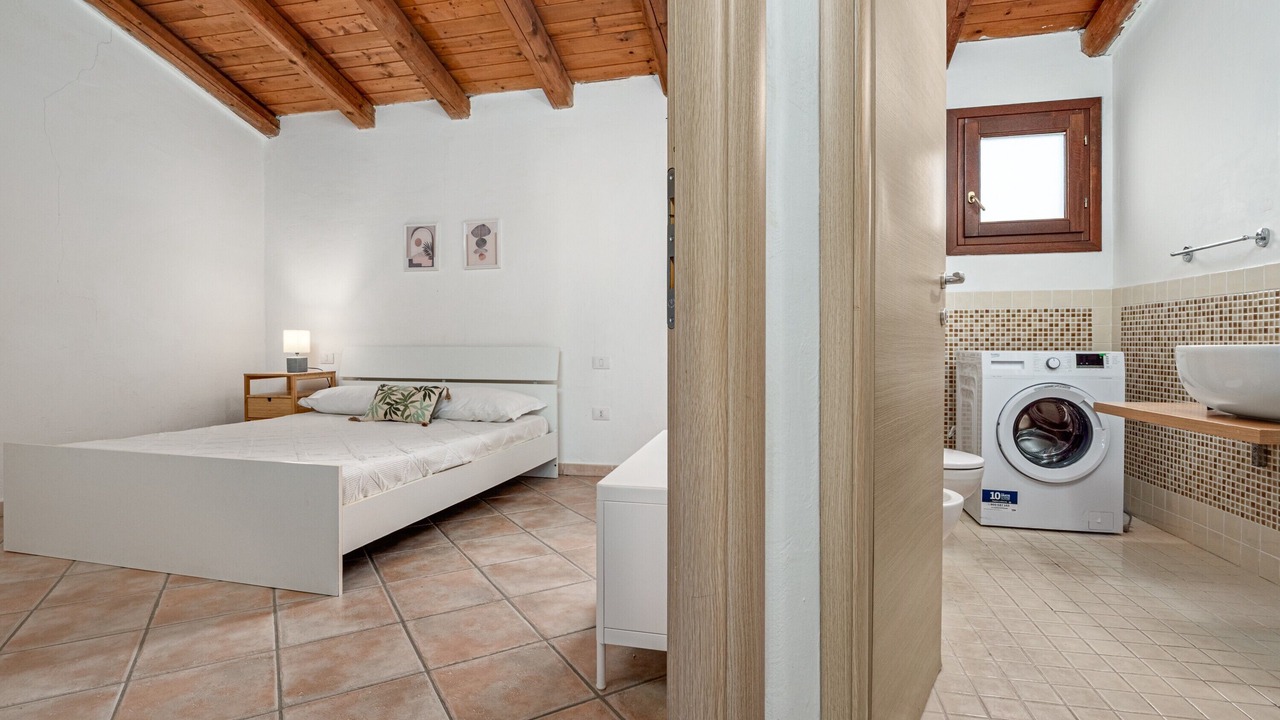 Photo of Bedroom in Baia Caddinas