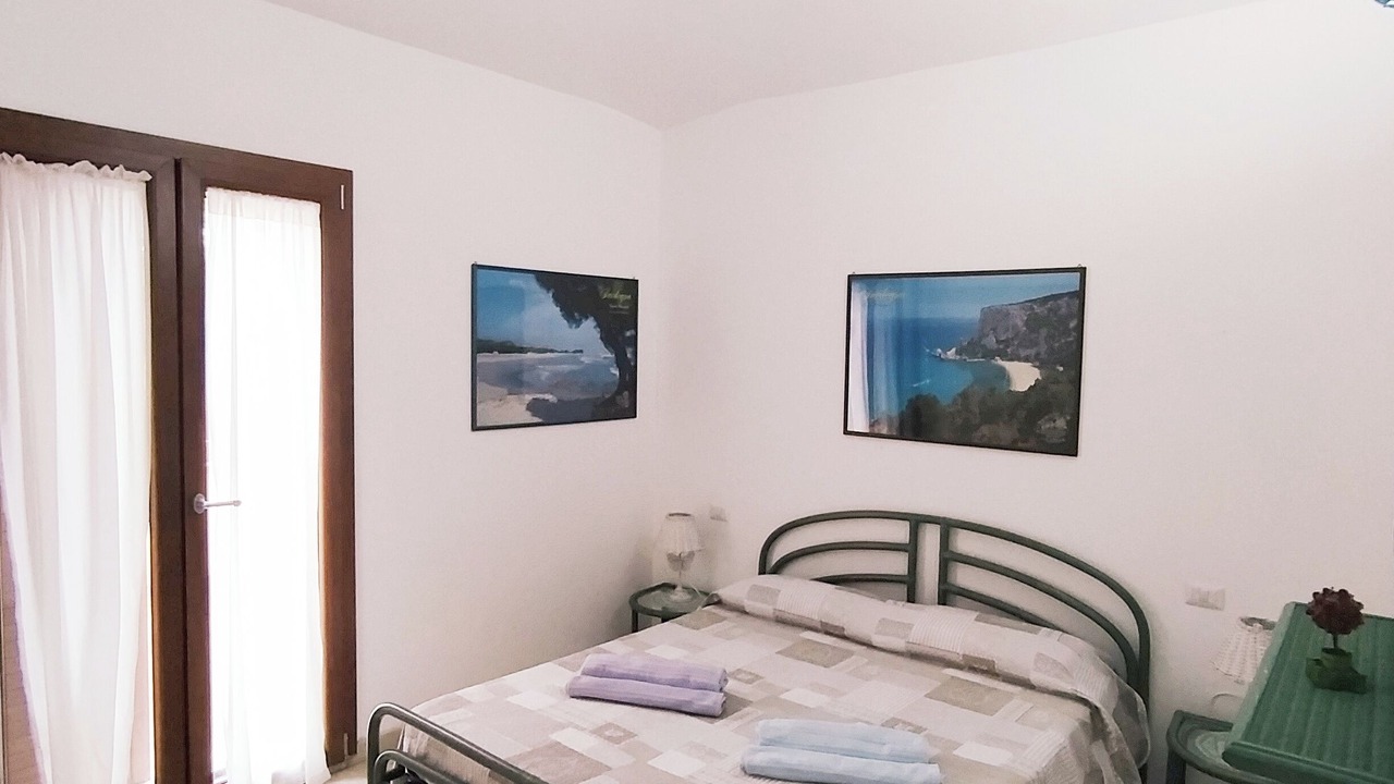 Photo of Bedroom in Cala Liberotto