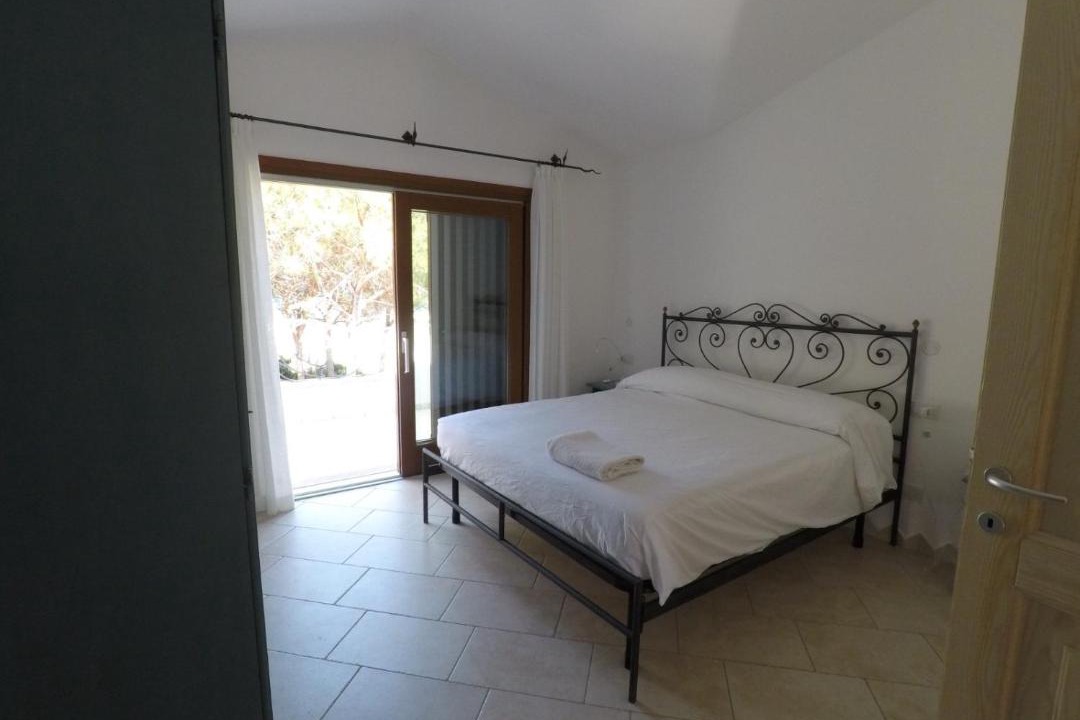 Photo of Bedroom in Cala Liberotto