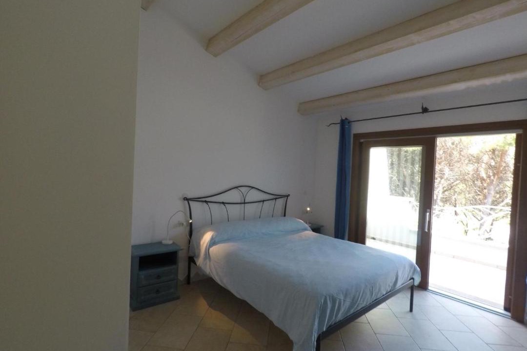Photo of Bedroom in Cala Liberotto