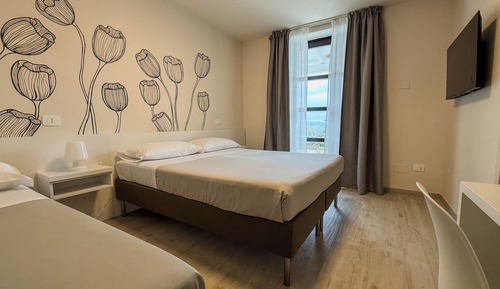 Deluxe Triple Room, Patio, Garden View