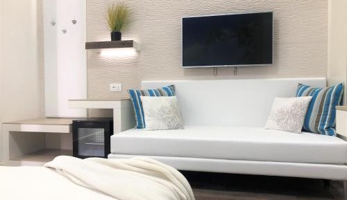Deluxe Triple Room with Partial Sea View and Free Beach Access