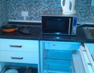 Quadruple Room with Kitchenette