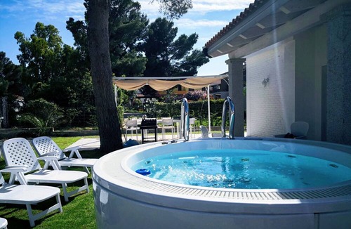 Porto Pino House | Villa Ikebana exklusiv in Porto Pino by Interhome