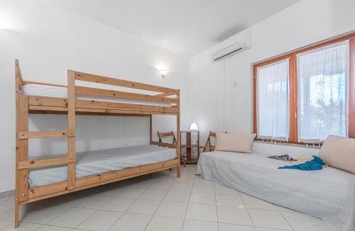 Li Cuncheddi Apartment | Il Faro di Capo Ceraso - Happy Rentals
